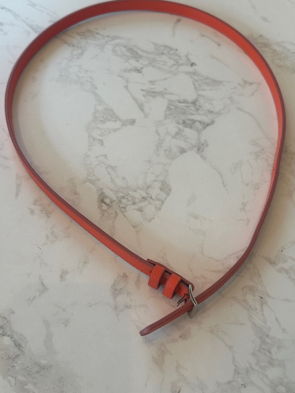 Excellent condition. Banana Republic women’s belt. Orange. Sz small. Silver